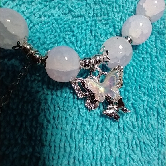 Silvertone white beaded aurora butterfly stretch bracelet - Picture 4 of 4